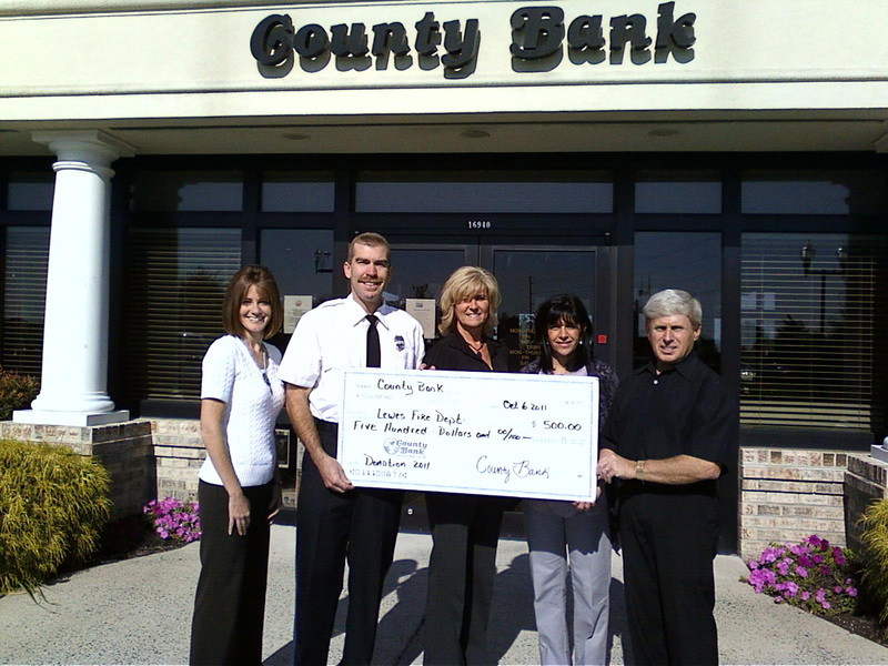 The staff of County Bank’s Lewes branch present a check for $500 to the Lewes Fire Department. Pictured are (l-r) Dana Magnan, County Bank customer service representative; Gordon Davis, Lewes Fire Department president; Leisa Sharrock, assistant vice president and manager of County Bank’s Lewes branch; Robin Young, head teller; and Ernie Dukes, customer service representative. SOURCE SUBMITTED